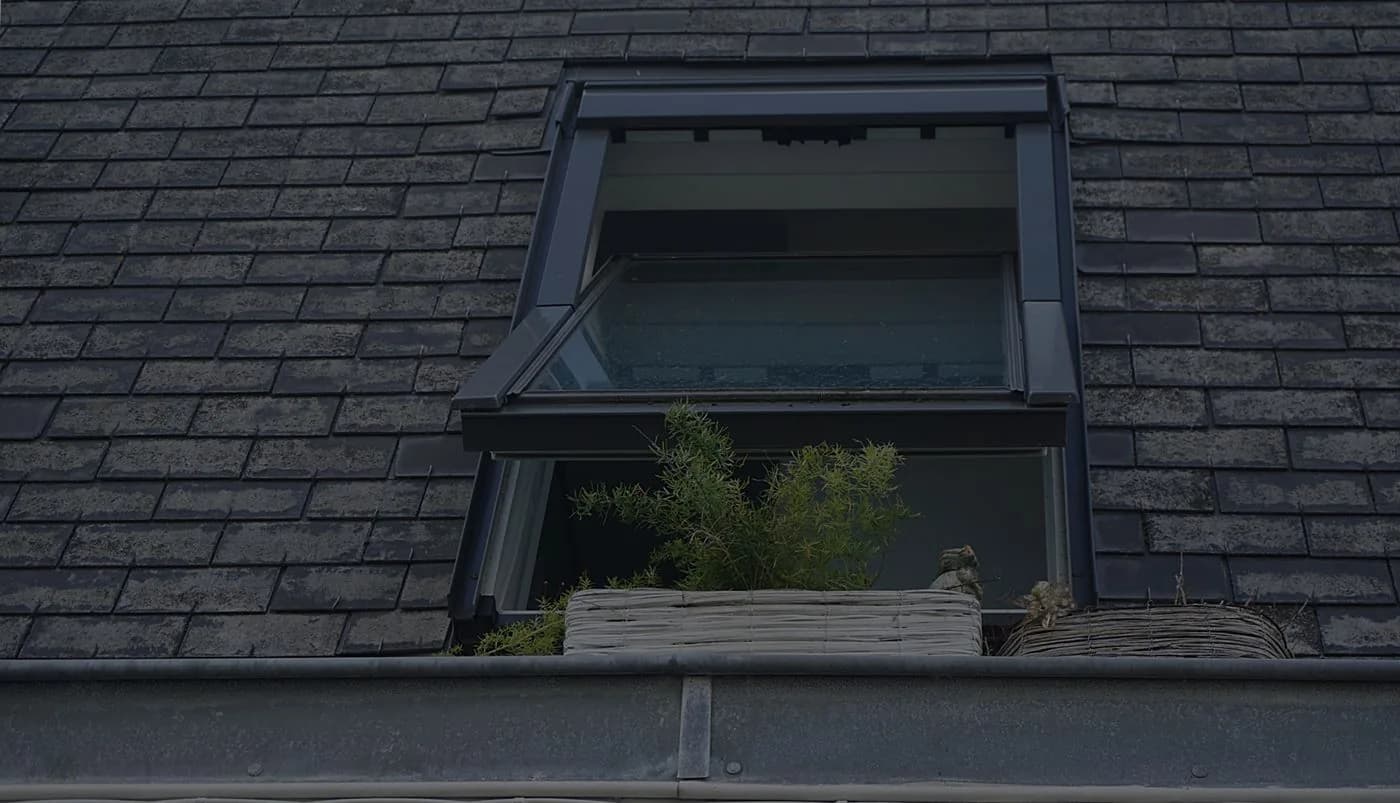 Roof window set within a tiled London roof