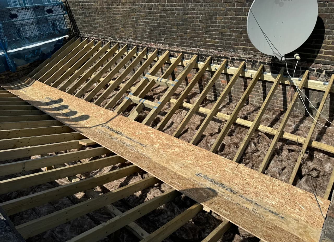 Roof structure replacement in Kensington, London