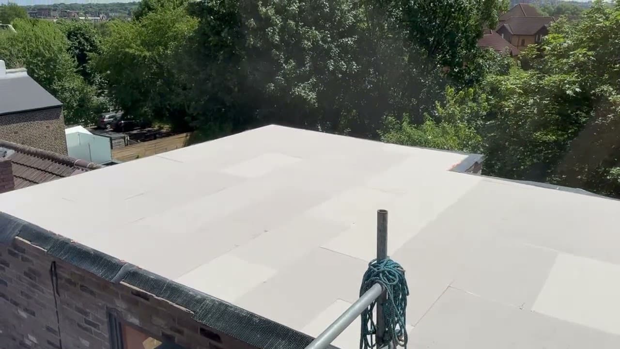 Insulation boards covering a London flat roof before the EPDM membrane is installed