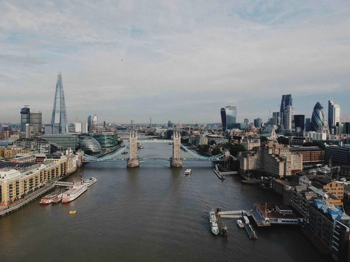 Tower Bridge and the London skyline beneath an open sky